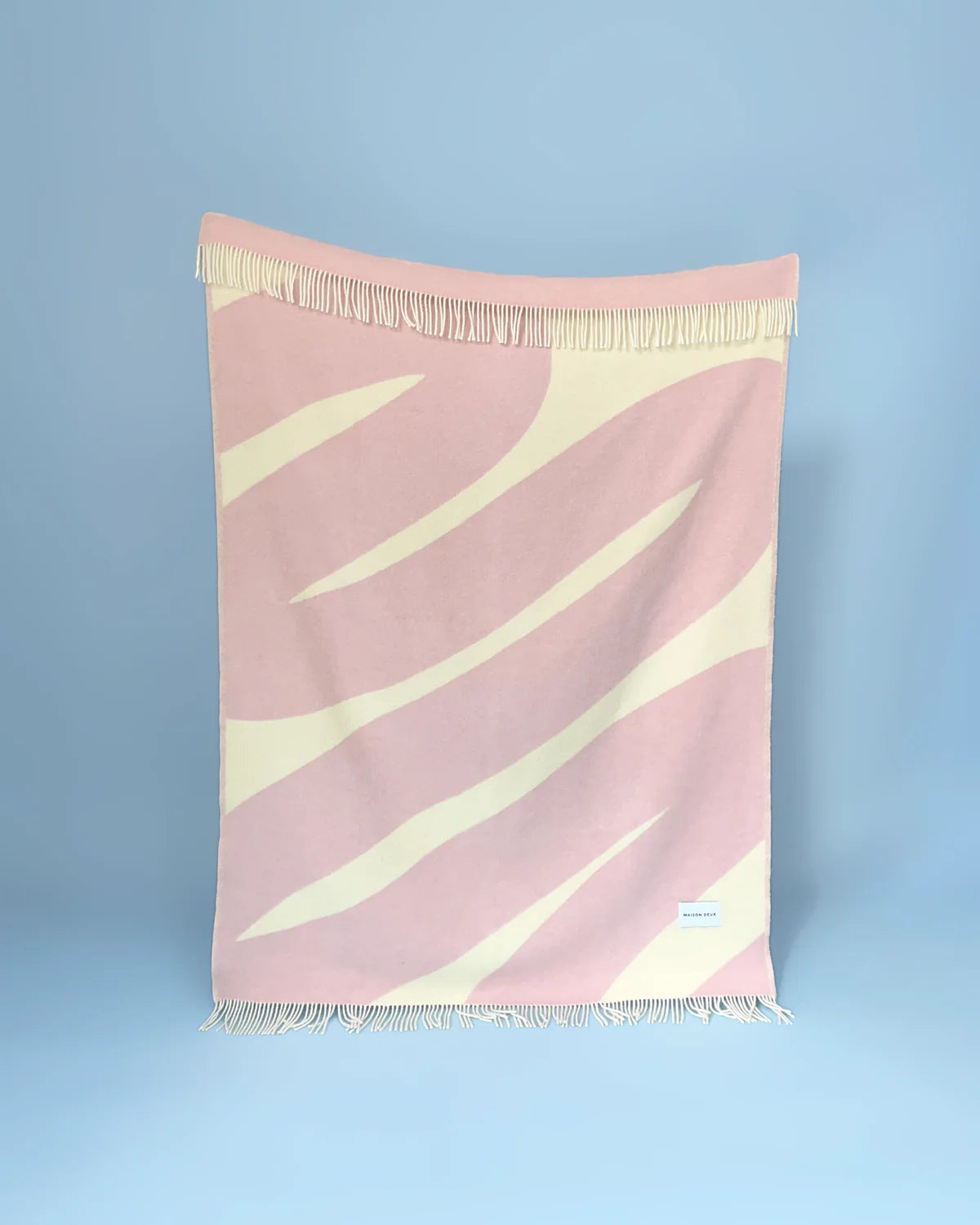 Wolldecke Swirl Blanket in der Farbe Butter Yellow und Pink von Maison Deux bei Frau Rabe im Concept Store Die Halle